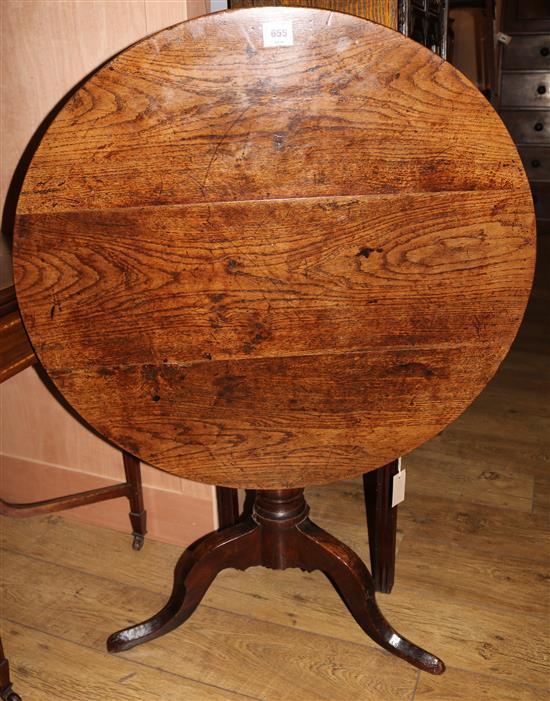 A George II oak tripod table, W.83cm